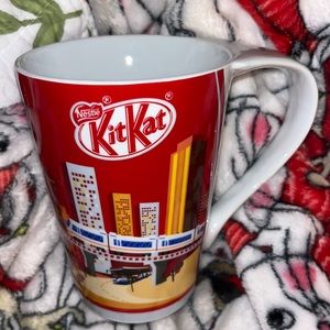 KitKat mug with city background